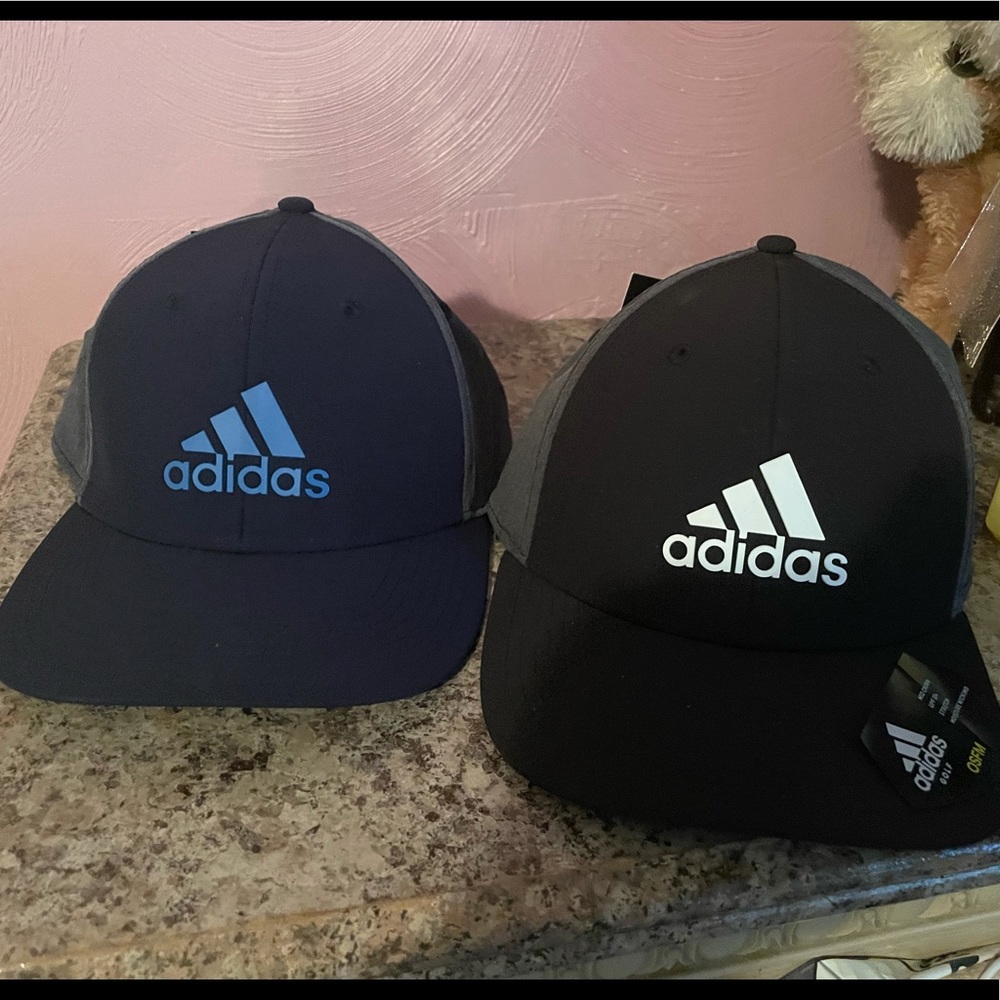 Brand new Adidas hats, two for 30